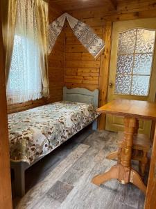 Postel nebo postele na pokoji v ubytování Sadyba Dana