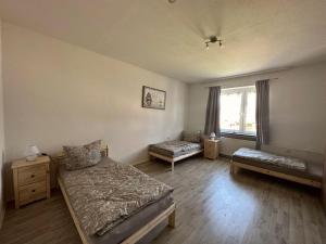 Postel nebo postele na pokoji v ubytování Monteurzimmer Rochau