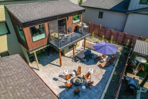 an aerial view of a house with a patio with a deck at Mini Marshmallow 30 Days minimum apts in Bend