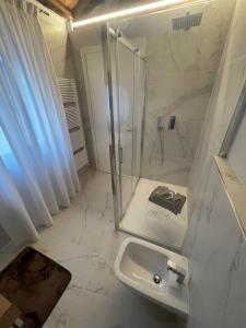 Um banheiro em Albergo Marin