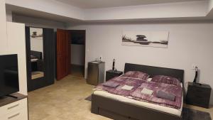 Letto o letti in una camera di Penzion YORK