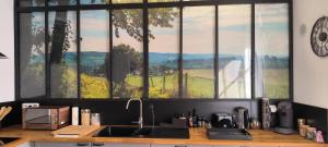 Kuchnia lub aneks kuchenny w obiekcie Appartement sous les remparts