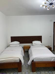 Cama o camas de una habitación en Z Pyramids Inn