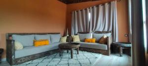 Voodi või voodid majutusasutuse Chalets-Appartements Tourtite toas