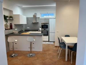Η κουζίνα ή μικρή κουζίνα στο La Casa di RosaBea