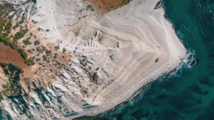 an aerial view of a sandy beach next to the ocean at Emesh Boutique Suite in Agrigento