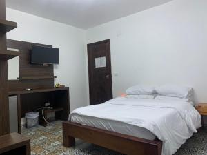 Cama o camas de una habitación en Z Pyramids Inn
