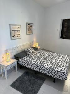 Łóżko lub łóżka w pokoju w obiekcie Low Island House