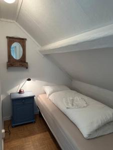 Säng eller sängar i ett rum på Hus med sentral beliggenhet