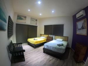 Giường trong phòng chung tại Casa La Coneja2