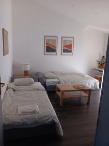 Postel nebo postele na pokoji v ubytování Apartman Dunav
