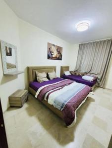 Ένα ή περισσότερα κρεβάτια σε δωμάτιο στο GHS app