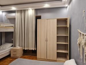 Postel nebo postele na pokoji v ubytování Merabi Guest House