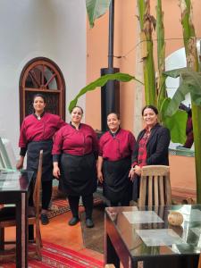 a group of women standing in a room at Riad El Grably in Marrakesh +61 photos