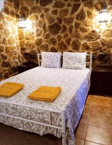 Ένα ή περισσότερα κρεβάτια σε δωμάτιο στο Casa Jobacho