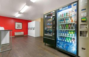 a soda machine in a store with soda bottles at Extended Stay America Suites - Santa Rosa - North in Santa Rosa