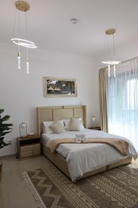 Postel nebo postele na pokoji v ubytování Stylish One Bedroom Apartment
