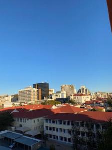 a view of a city with tall buildings at Yolé Apartment - City 101 in Windhoek