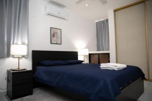 Postel nebo postele na pokoji v ubytování Residenciales H1 & H2 - Best Location in Santiago 10 min from Airport