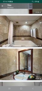 a bathroom with a sink and a mirror at Two bedroom suite Apartment, Jayakarta,Legian, Unit 6420, block A ,4th floor in Seminyak