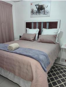 Кровать или кровати в номере Ngqamakwe Luxury Guest House and Conference Centre
