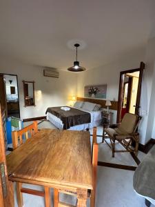 Cama ou camas em um quarto em Pousada Villa Nina