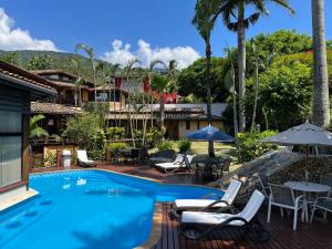 A piscina localizada em Pousada Villa Nina ou nos arredores