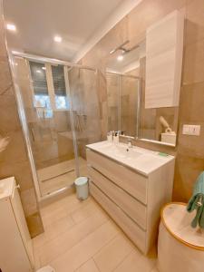 a bathroom with a shower and a sink at Fifi Home in Pozzuoli