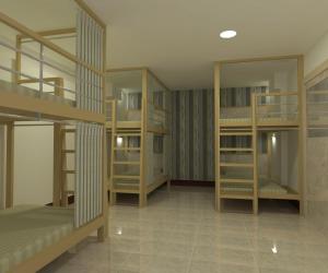 Postel nebo postele na pokoji v ubytování Malee Hotel