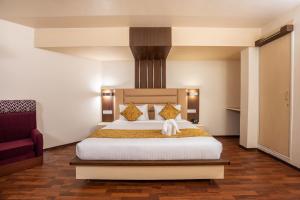 Postel nebo postele na pokoji v ubytování Poppys Pleasant Stay