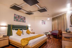 Postel nebo postele na pokoji v ubytování Poppys Pleasant Stay
