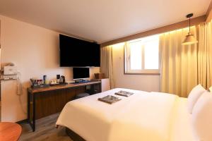 Postel nebo postele na pokoji v ubytování STAY201 + 33 fotografií