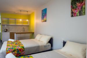 Llit o llits en una habitació de Yatulau Hotel and Conference