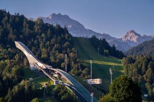 a curvy road in the middle of a mountain at Alpin Kanker Suites 1 in Garmisch-Partenkirchen