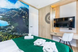 Giường trong phòng chung tại Bukowina Tatrzańska - Czarna Góra- Monte di Sole +207 ảnh