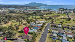an aerial view of a town with a red stop sign at Bermagui Breeze Holiday House 5 bedroom 18-20 Mumbulla Street - Bermagui in Bermagui