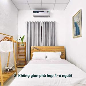 Llit o llits en una habitació de Nại Home Venuestay