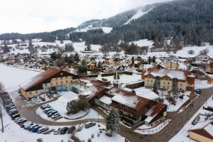 an aerial view of a town in the snow at Azureva Métabief in Métabief