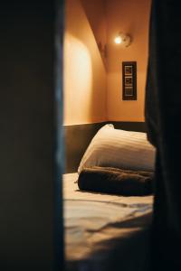 Postel nebo postele na pokoji v ubytování Mellow Ladies Hostel