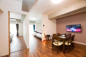 A television and/or entertainment centre at STAYTUS - Vacation STAY 62201v