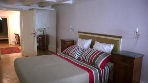 A bed or beds in a room at In Venice Back To San Marco tourist apartment