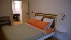 A bed or beds in a room at In Venice Back To San Marco tourist apartment