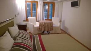 A seating area at In Venice Back To San Marco tourist apartment