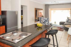 Kuchyň nebo kuchyňský kout v ubytování Stunning 2 bed modern apartment