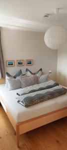 A bed or beds in a room at Panorama Erlebnis