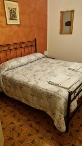 Posteľ alebo postele v izbe v ubytovaní B&B I Lazzarini
