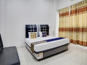Легло или легла в стая в SPOT ON 92904 Penginapan Pakam