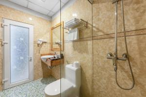 Koupelna v ubytování Tiger Sapa hotel