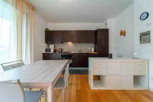 Кухня или мини-кухня в Como Comfort Flat by Wonderful Italy
