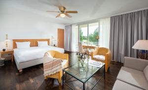 Precise Resort Rügen Apartments & SPLASH Erlebniswelt客房内的一张或多张床位